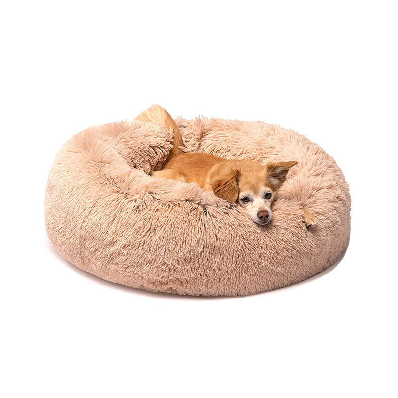 Round plush pet bed designed for small dogs, featuring a deep cushioned sleeping area with raised edges that provide comfort, support, and a secure resting space