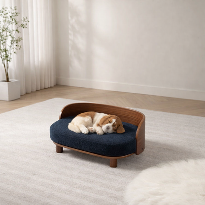 Scandinavian style elevated pet sofa bed designed for dogs, featuring a cushioned sleeping surface with a curved wooden backrest and raised legs for comfortable lounging and rest