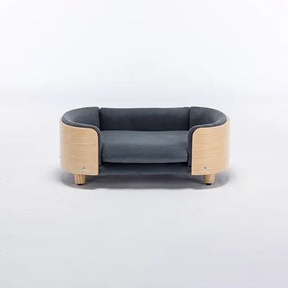 Scandinavian style elevated pet sofa bed designed for dogs, featuring a cushioned sleeping surface with curved supportive sides and raised legs for comfortable lounging and rest