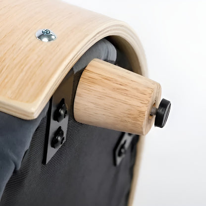 Scandinavian style elevated pet sofa bed designed for dogs, featuring a cushioned sleeping surface with curved supportive sides and raised legs for comfortable lounging and rest