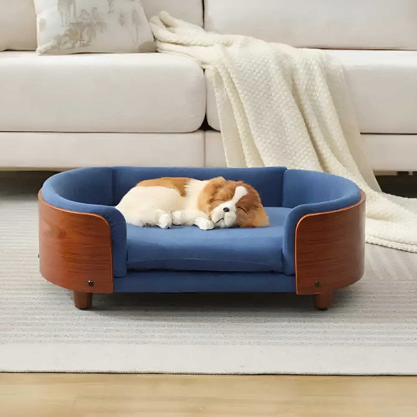 Scandinavian style elevated pet sofa bed designed for dogs, featuring a cushioned sleeping surface with wraparound supportive side panels and a raised base for stable and comfortable resting